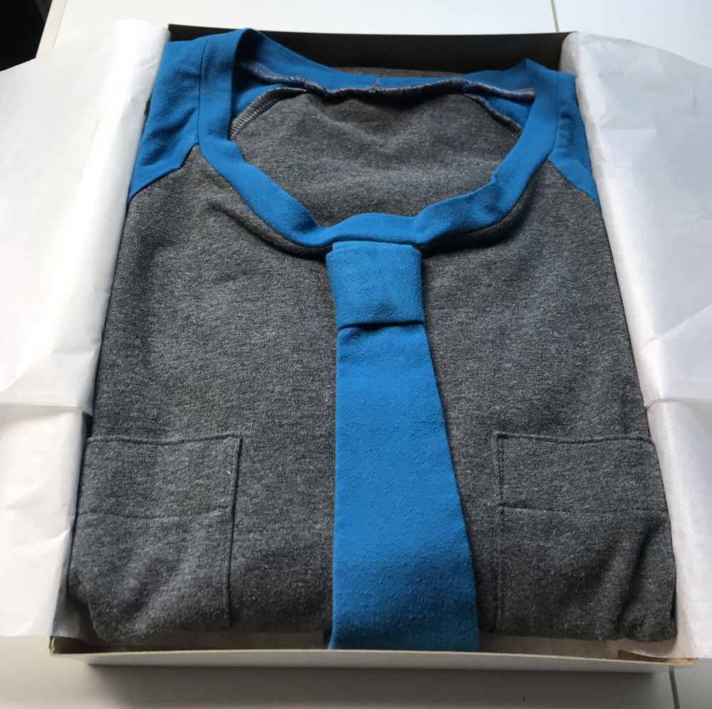 T-shirt with a tie in a gift box